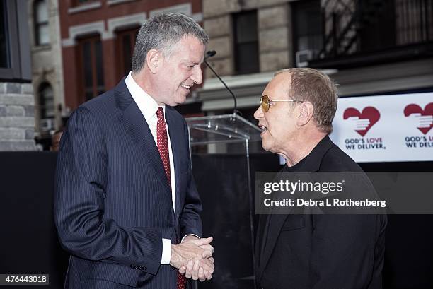 Mayor Bill de Blasio and Michael Kors attend the celebration of God's Love We Deliver returning to Soho with a dedication of the new Michael Kors...