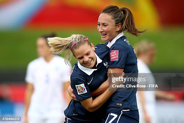 Eugenie Le Sommer of France celebrates with Gaetane Thiney after scoreing her goal during the FIFA Women's World Cup 2015 Group F match between...