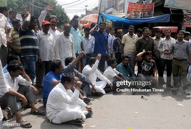 Municipal Corporation of East Delhi sanitation workers sitting on the strike to protest non-payment of salaries on the main road at Jheel Chowk...