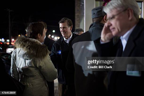 Former Virginia Lieutenant Gov. Donald S. Beyer Jr., welcomes guests to the Mount Vernon District Democratic Committee's annual Mardi Gras fundraiser...