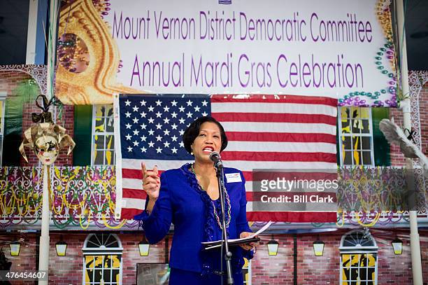 Lavern Chatman speaks during the Mount Vernon District Democratic Committee's annual Mardi Gras fundraiser at Don Beyer's Volvo car dealership in...
