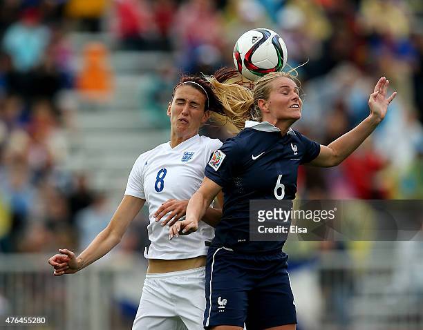 Jill Scott of England and Amandine Henry of France head the ball in the second half during the FIFA Women's World Cup 2015 Group F match at Moncton...