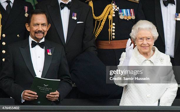 Queen Elizabeth II and The Sultan of Brunei attend the Gurkha 200 pageant at Royal Hospital Chelsea on June 9, 2015 in London, England.