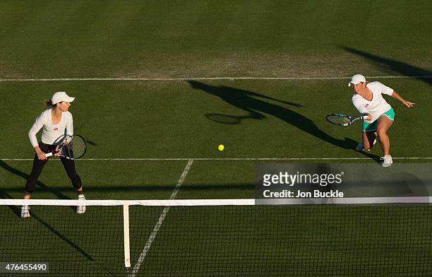 Lisa Raymond of the United States returns the ball during her doubles match with Cara Black of Zimbabwe in their match against Jarmila Gajdosova of...