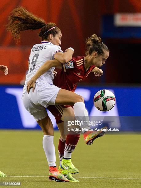 Carolina Venegas of Costa Rica challenges Leire Landa of Spain during the 2015 FIFA Women's World Cup Group E match at Olympic Stadium on June 9,...