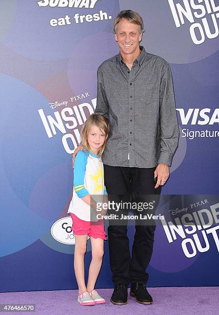 Tony Hawk and daughter Kadence Clover Hawk attend the premiere of "Inside Out" at the El Capitan Theatre on June 8, 2015 in Hollywood, California.