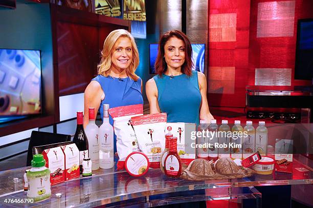 Bethenny Frankel poses with host Melissa Francis on the set of "After The Bell" on FOX Business Network at FOX Studios on June 9, 2015 in New York...