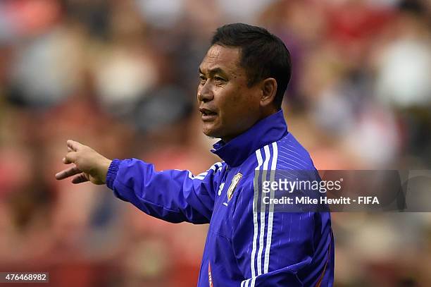 Japan coach Norio Sasaki issues instructions during the FIFA Women's World Cup 2015 Group C match between Japan and Switzerland at BC Place Stadium...
