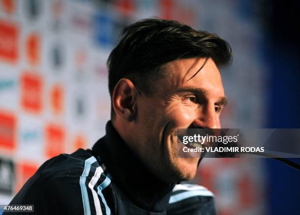 Argentinian football team player Lionel Messi smiles during a press conference in La Serena, Chile on June 9 ahead of the Copa America 2015, which...