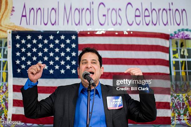 Mark Levine, The Aggressive Progressive, speaks during the Mount Vernon District Democratic Committee's annual Mardi Gras fundraiser at Don Beyer's...