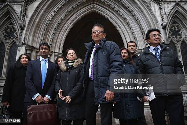 Relatives of Anni Dewani, including her father Vinod Hindocha , make a short statement to the gathered media outside the High Court after an...