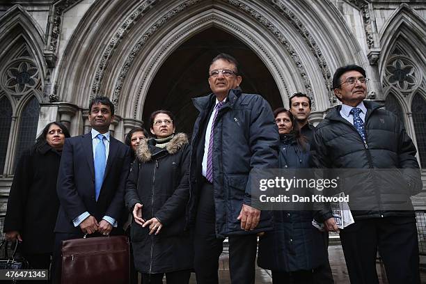 Relatives of Anni Dewani, including her father Vinod Hindocha , make a short statement to the gathered media outside the High Court after an...