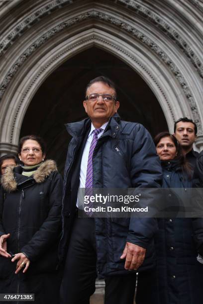 Relatives of Anni Dewani, including her father Vinod Hindocha , make a short statement to the gathered media outside the High Court after an...