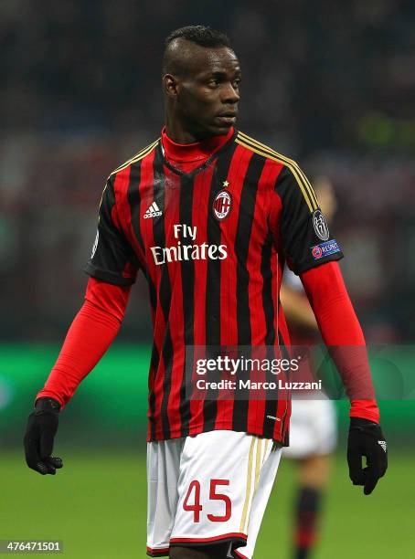 Mario Balotelli looks on during the UEFA Champions League Round of 16 match between AC Milan and Club Atletico de Madrid at Stadio Giuseppe Meazza on...