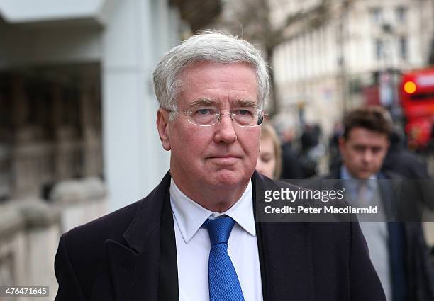 Michael Fallon, Minister of State for Business and Enterprise leaves the Cabinet Office after attending a National Security Council meeting on March...