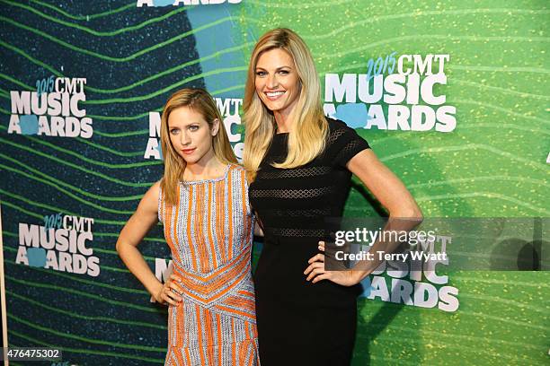Actress Brittany Snow and Erin Andrews attend the 2015 CMT Music Awards Press Preview Day at the Bridgestone Arena on June 9, 2015 in Nashville,...
