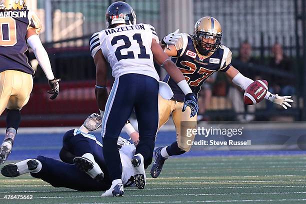 Ontario- JUNE 9 - Winnipeg Blue Bombers safety Teague Sherman tracks down a fumble as the Toronto Argonauts play the Winnipeg Blue Bombers as Varsity...