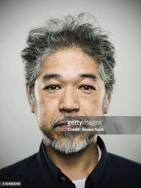 portrait of a real japanese man with grey hair. - fine art portrait stockfoto's en -beelden