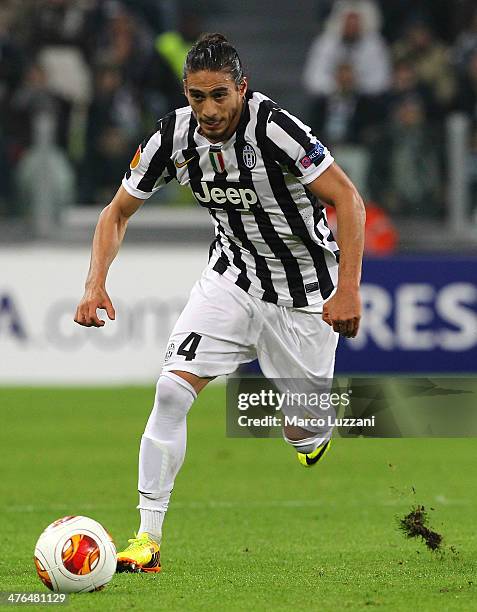 Martin Caceres of Juventus FC in action during the UEFA Europa League Round of 32 match between Juventus and AS Trabzonspor at Juventus Arena on...