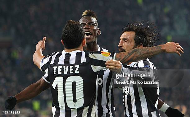 Paul Pogba of Juventus FC celebrates with his team-mates Carlos Tevez and Andrea Pirlo during the UEFA Europa League Round of 32 match between...