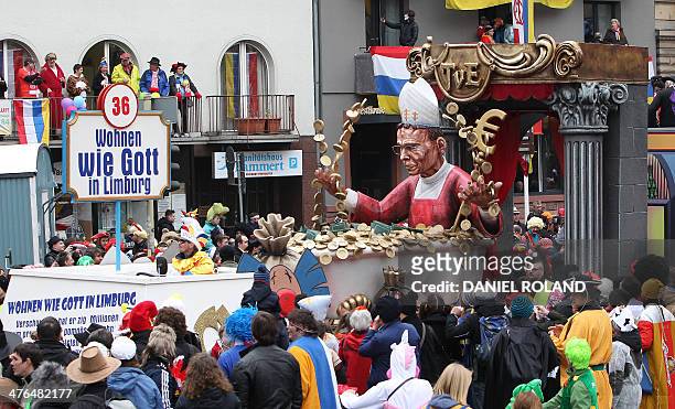 The carnival truck 'Living like god in Limburg' caricatures the German bishop Franz-Peter Tebartz van Elst from Limburg, western Germany who is...
