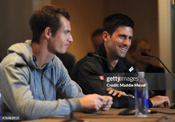 Novak Djokovic of Serbia answers questions as Andy Murray of Great Britain looks on during the BNP Paribas Showdown Press Conference at Essex House...