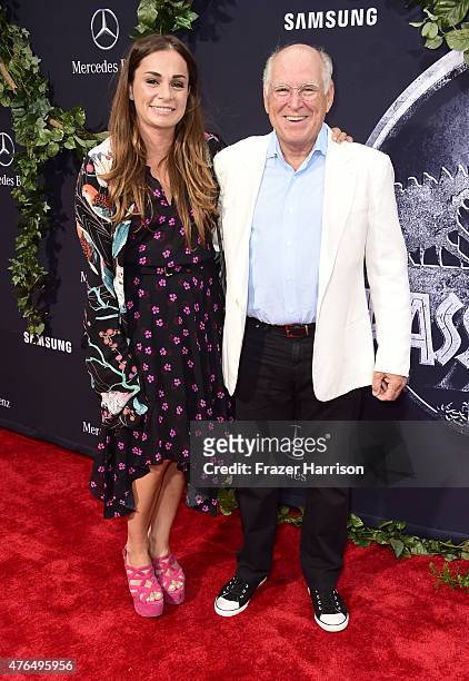 Singer/songwriter Jimmy Buffett and guest attend the Universal Pictures' "Jurassic World" premiere at Dolby Theatre on June 9, 2015 in Hollywood,...
