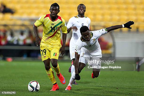 Adama Traore of Mali holds off the challenge of Emmanuel Ntim of Ghana during the FIFA U-20 World Cup New Zealand 2015 Round of 16 match between...
