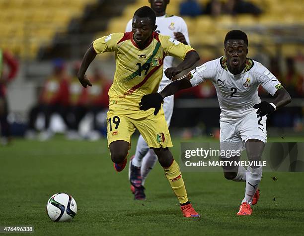 Adama Traore of Mali fights for the ball with Emmanuel Ntim of Ghana during their FIFA Under-20 World Cup round of 16 football match at Wellington...