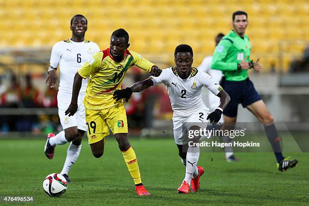 Adama Traore of Mali holds off the challenge of Emmanuel Ntim of Ghana during the FIFA U-20 World Cup New Zealand 2015 Round of 16 match between...