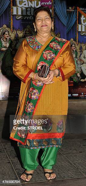 Indian Bollywood choreographer Saroj Khan poses for a photograph during a promotional event for the Hindi film 'Tanu Weds Manu Returns' in Mumbai on...