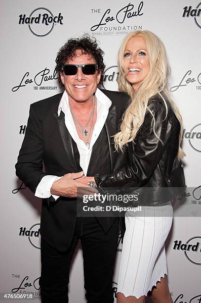 Neal Schon and wife Michaele Schon attend Les Paul's 100th Anniversary Celebration at the Hard Rock Cafe - Times Square on June 9, 2015 in New York...
