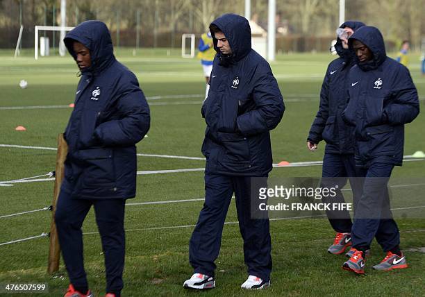 Enzo Zidane , the 18-year-old son of French legend Zinedine Zidane who plays in the youth team of Real Madrid, walks with players of the France U19...