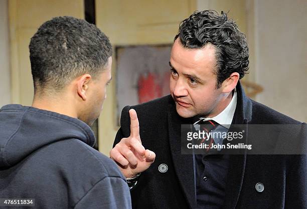 Calvin Demba, as Jordan and Daniel Mays, as Kidd perform on stage during a performance of 'The Red Lion' a new play by Patrick Marber at The National...
