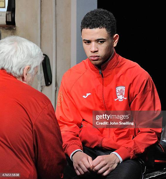 Peter Wight, as Yates and Calvin Demba as Jordan perform on stage during a performance of 'The Red Lion' a new play by Patrick Marber at The National...