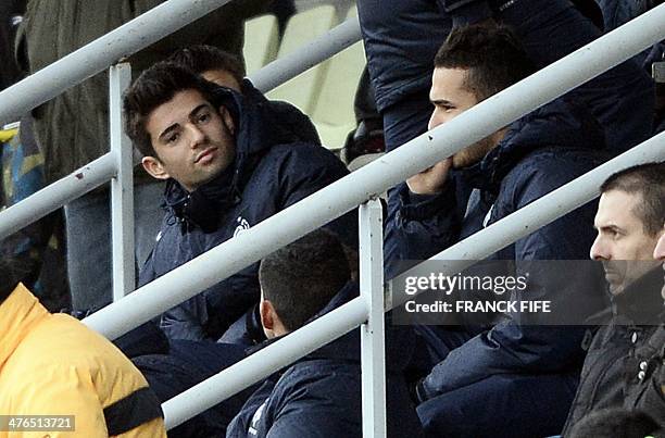 Enzo Zidane , the 18-year-old son of French legend Zinedine Zidane who plays in the youth team of Real Madrid, sits in the stands during a training...