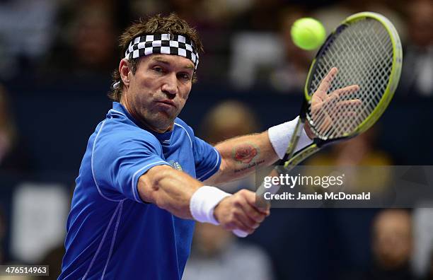 Pat Cash in action during his match against Ivan Lendl during the World Tennis Day London Showdown press conference at the Athenaeum Hotel at...