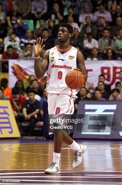 Emmanuel Mudiay of Guangdong Southern Tigers in action during the CBA 14/15 game against Sichuan Jinqiang on November 16, 2014 in Dongguan, Guangdong...