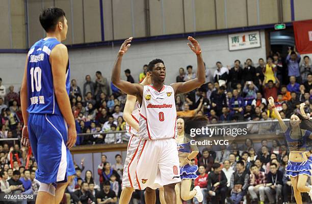 Emmanuel Mudiay of Guangdong Southern Tigers in action during the CBA 14/15 game against Qingdao Doublestar on November 9, 2014 in Dongguan,...