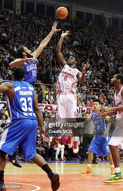 Emmanuel Mudiay of Guangdong Southern Tigers in action during the CBA 14/15 game against Qingdao Doublestar on November 9, 2014 in Dongguan,...