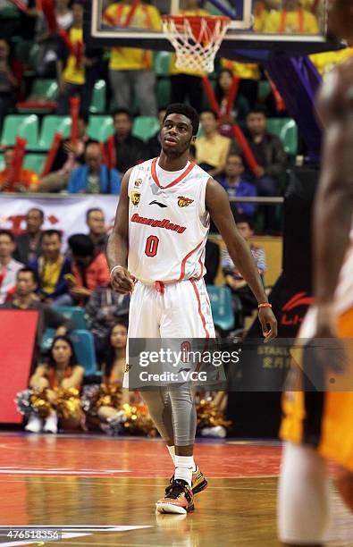 Emmanuel Mudiay of Guangdong Southern Tigers in action during the CBA 14/15 game against Chongqing Fly Dragon on November 19, 2014 in Dongguan,...