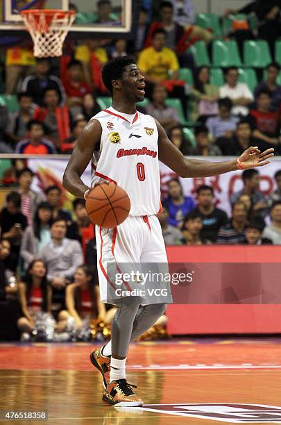 Emmanuel Mudiay of Guangdong Southern Tigers in action during the CBA 14/15 game against Chongqing Fly Dragon on November 19, 2014 in Dongguan,...