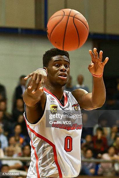 Emmanuel Mudiay of Guangdong Southern Tigers in action during the CBA 14/15 game against Qingdao Doublestar on November 9, 2014 in Dongguan,...