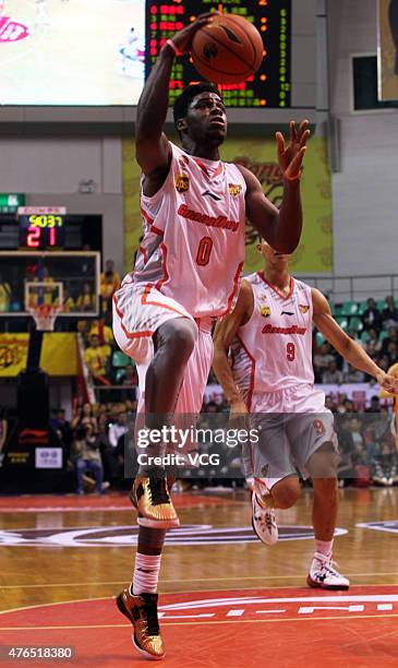 Emmanuel Mudiay of Guangdong Southern Tigers in action during the CBA 14/15 game against Chongqing Fly Dragon on November 19, 2014 in Dongguan,...