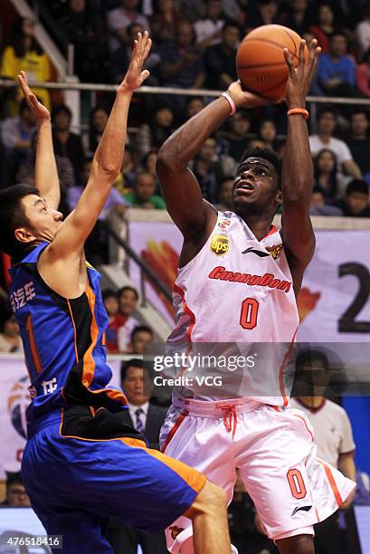 Emmanuel Mudiay of Guangdong Southern Tigers in action during the CBA 14/15 game against Sichuan Jinqiang on November 16, 2014 in Dongguan, Guangdong...