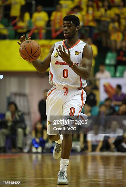 Emmanuel Mudiay of Guangdong Southern Tigers in action during the CBA 14/15 game against Sichuan Jinqiang on November 16, 2014 in Dongguan, Guangdong...