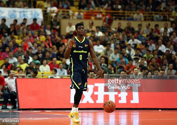 Emmanuel Mudiay of Guangdong Southern Tigers in action during the CBA 14/15 game against Foshan Dralions on November 14, 2014 in Foshan, Guangdong...