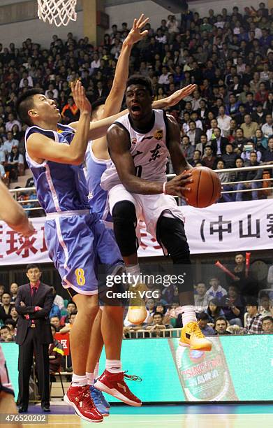 Emmanuel Mudiay of Guangdong Southern Tigers in action during the CBA 14/15 game against Shandong Hi-speed on November 7, 2014 in Dongguan, Guangdong...