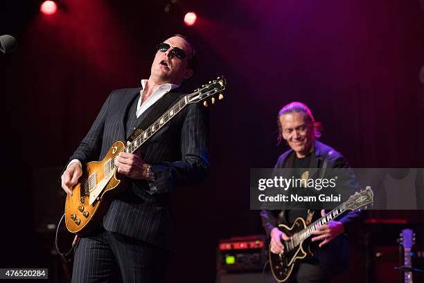 Joe Bonamassa and G. E. Smith perform during Les Paul's 100th anniversary celebration at Hard Rock Cafe - Times Square on June 9, 2015 in New York...