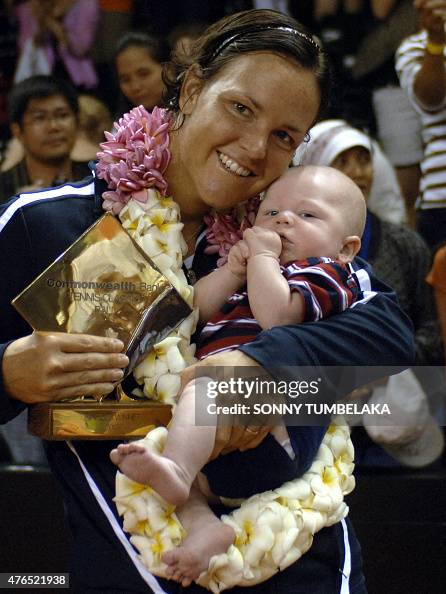 TOPSHOT - Lindsay Davenport of the US poses with her child Jagger ...